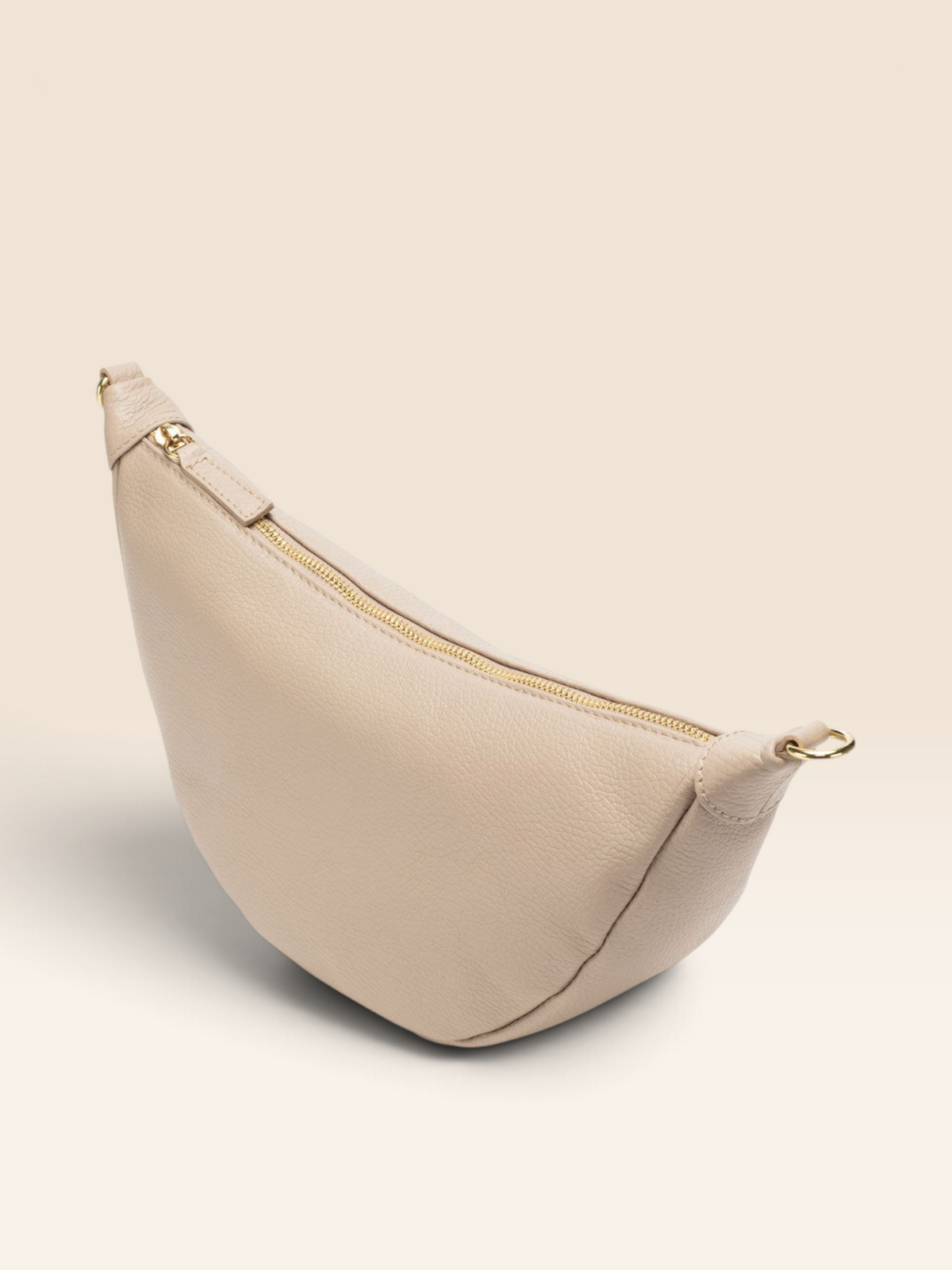 Side View Image of a Biscuit Beige Leather Hobo bag for Women by Elie Beaumont