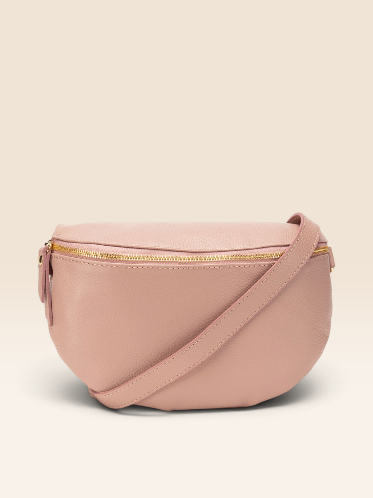 Image of a Blush Pink Leather Large Sized Slingbag with matching strap for Women by Elie Beaumont