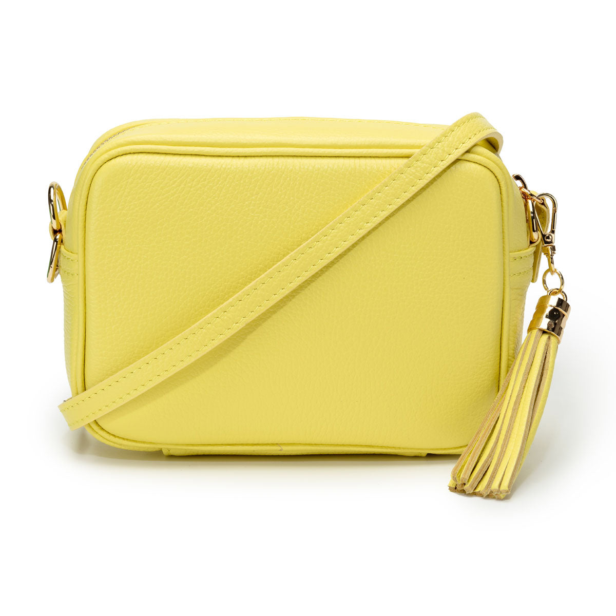Full frontal view with matching strap of a Lemon Yellow Leather Crossbody Tassel Bag for Women by Elie Beaumont