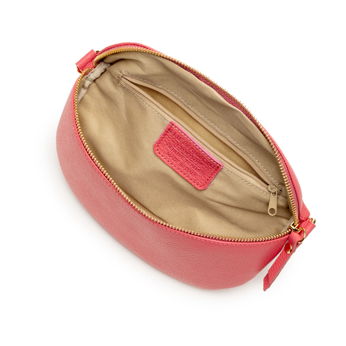 Birds Eye Image of an open Strawberry Pink Leather Regular Sized Slingbag with matching strap for Women by Elie Beaumont