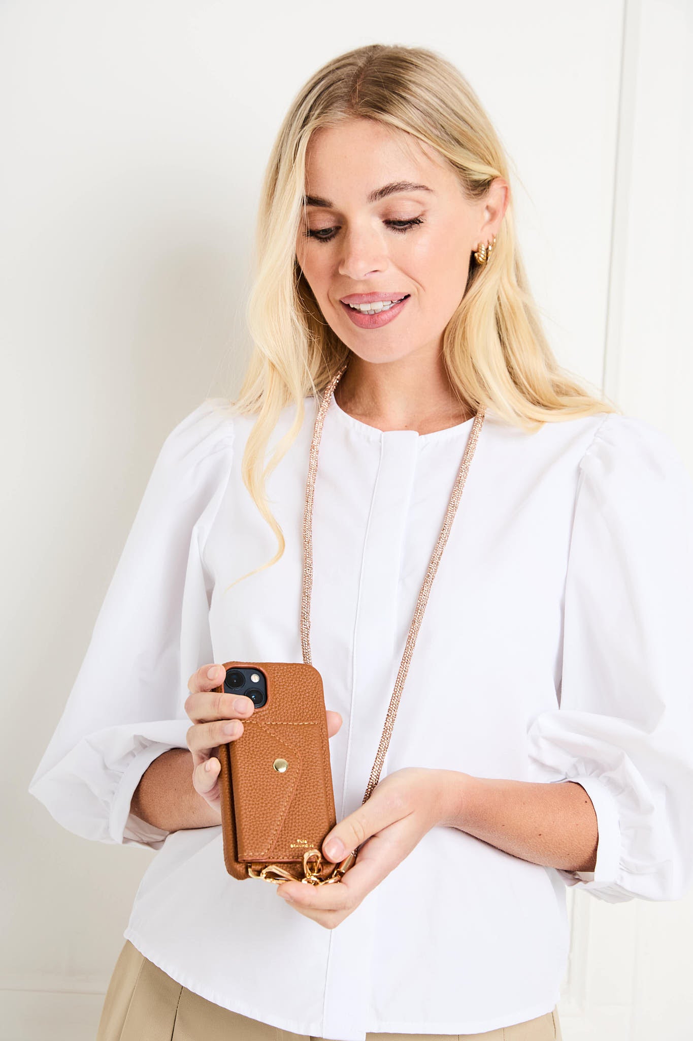 Model Image of Tan Leather iPhone case with Lanyard for Women by Elie Beaumont