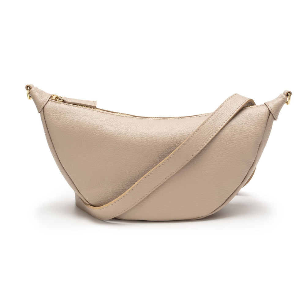 Image of a Biscuit Beige Leather Hobo Bag with matching strap for Women by Elie Beaumont