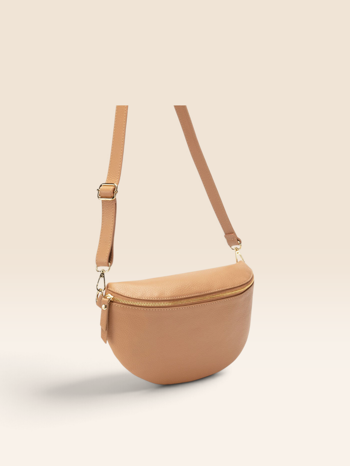 Front View Image of a Camel Brown Leather Large Sized Slingbag with strap for Women by Elie Beaumont
